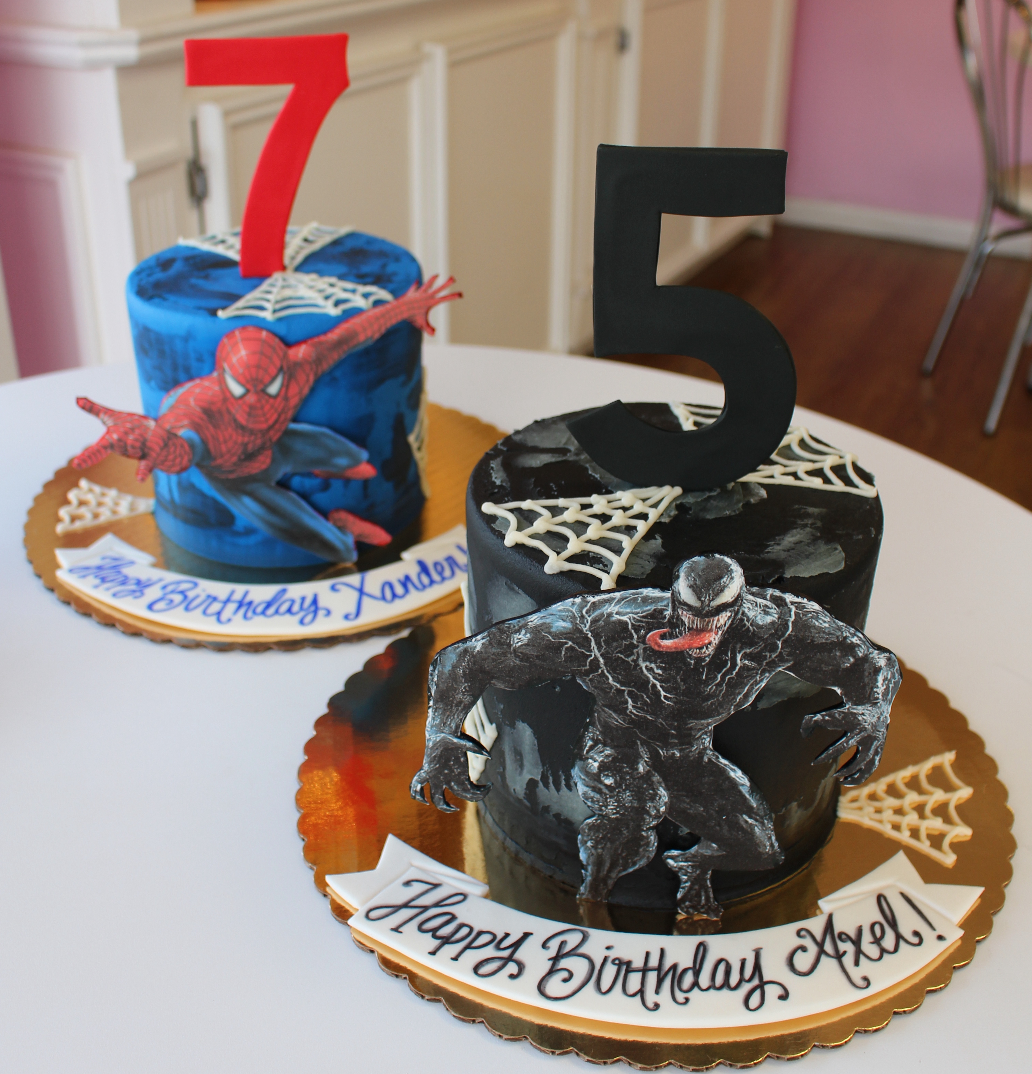 Blue Marvel Spiderman and Black Venom Kids Birthday Cakes with Hand Piped Spider Webbing