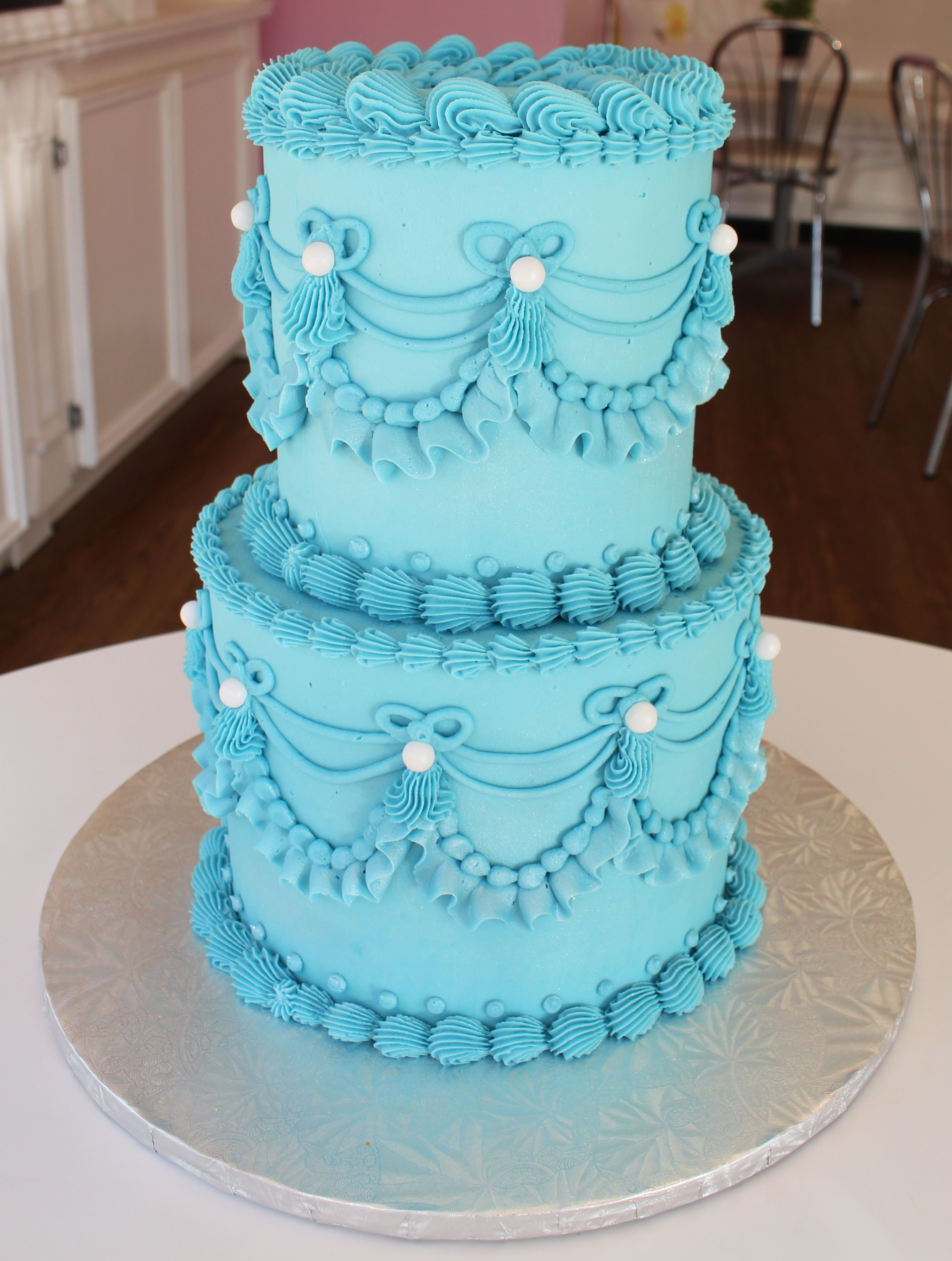 Blue Two Tier Vintage Hand Piped Cake with White Sugar Pearls