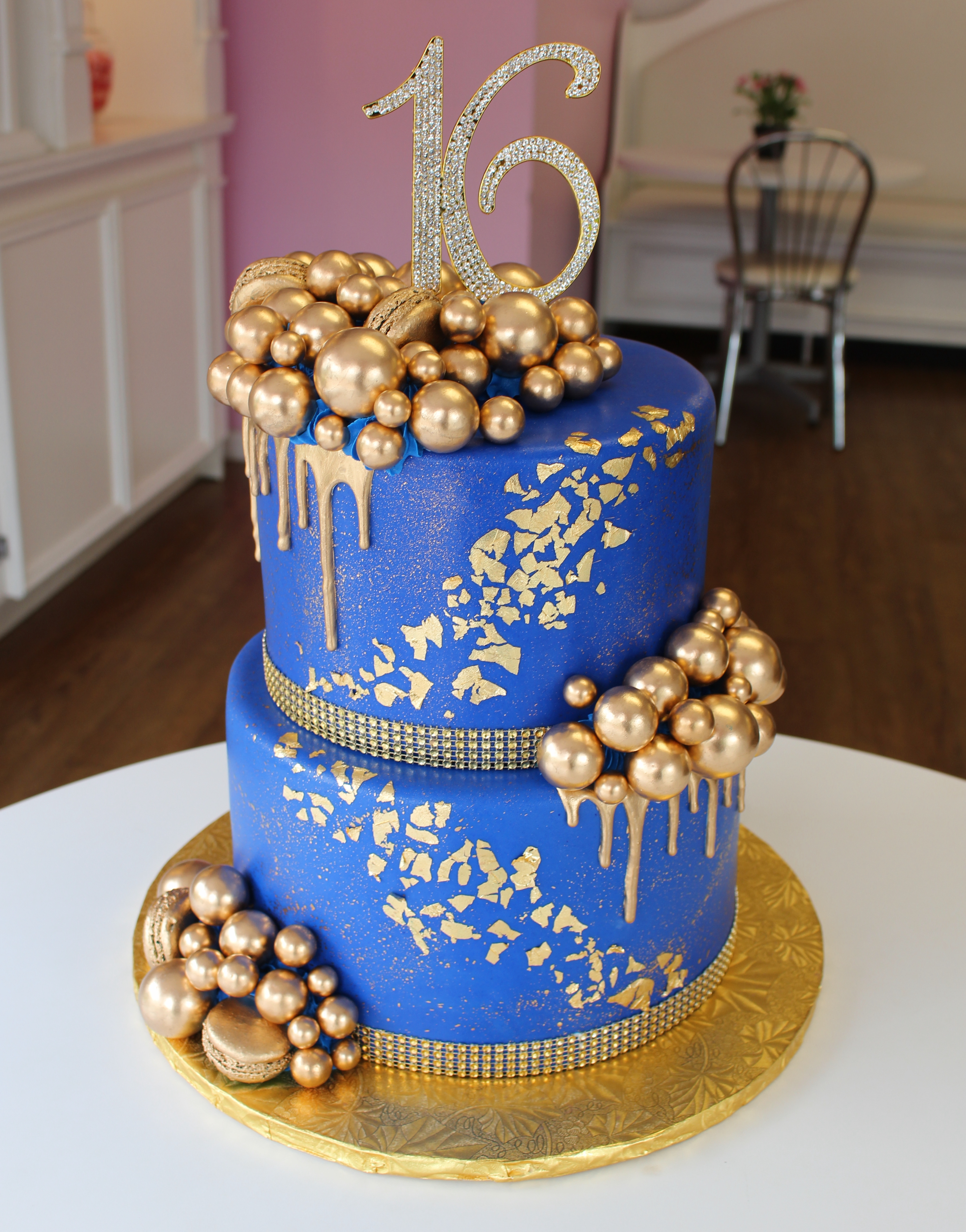 Blue and Gold Sweet Sixteen Birthday Cake with Bling Border Gold Balloons and Flakes