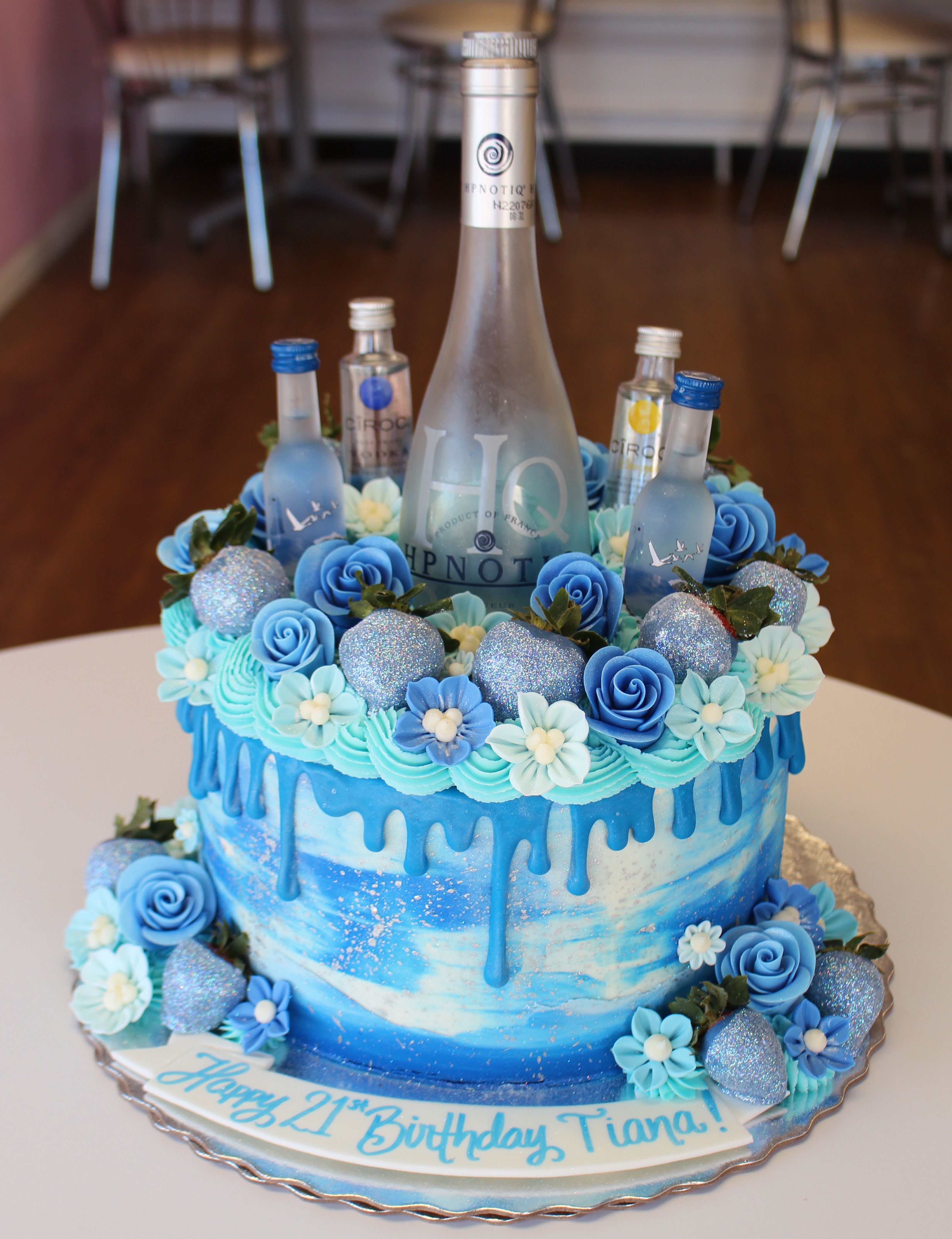 Blue and White Marbled 21st Birthday Drip Cake with Real Bottles and Fondant Flowers