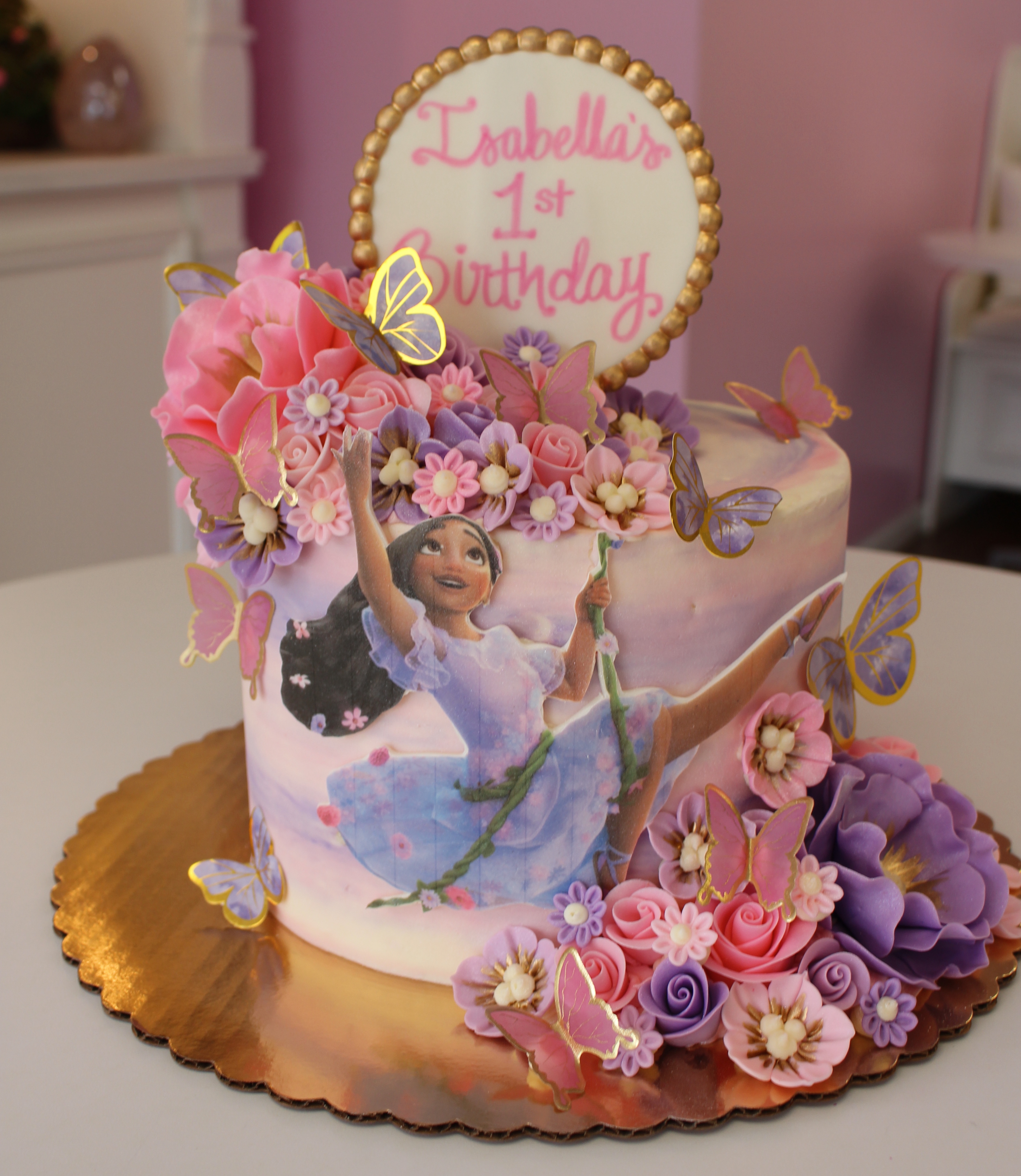 Disney Pixar Encanto Pink and Purple Girl Kids Cake with Fondant Flowers and Paper Butterflies