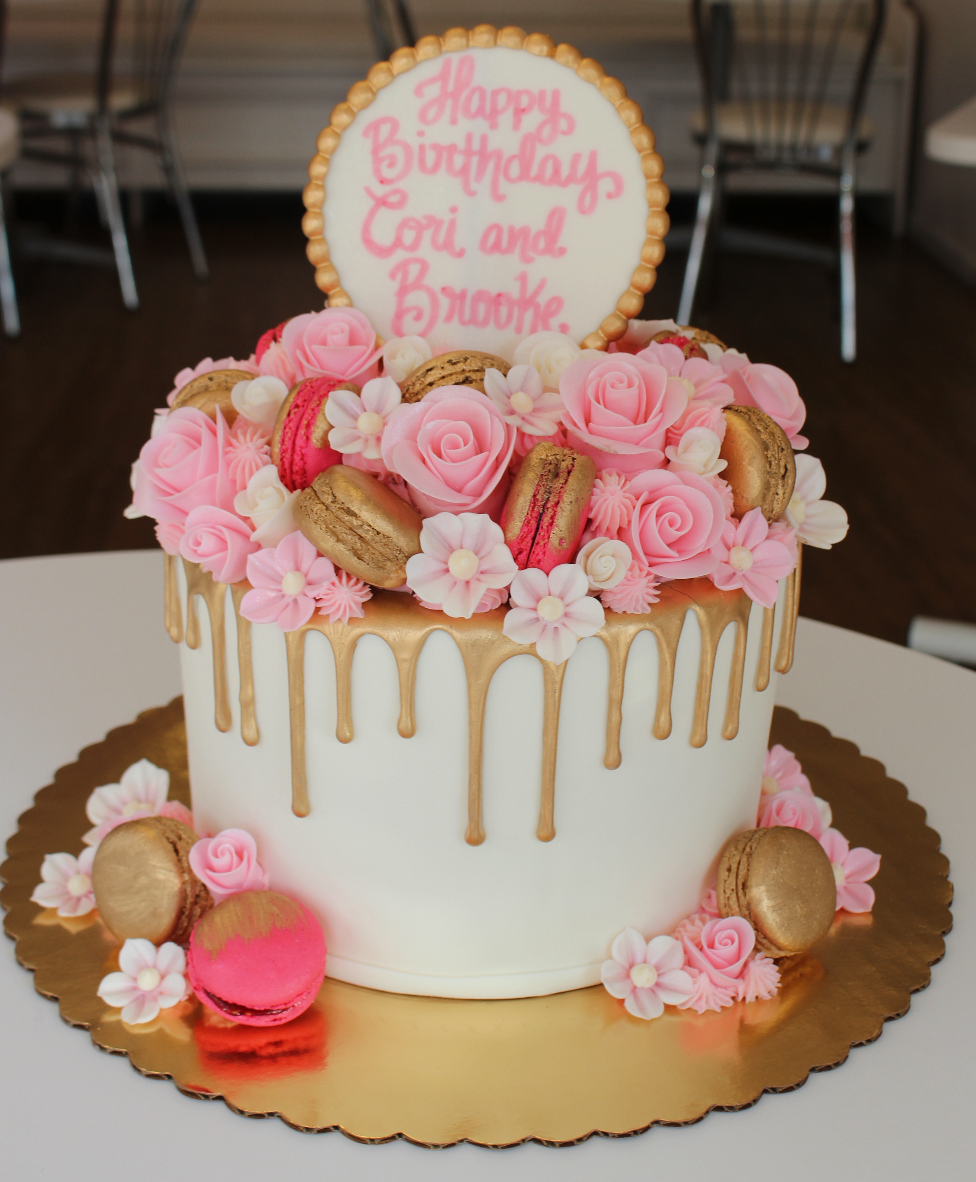 Gold and White Drip Cake with Pink Macarons and Fondant Flowers
