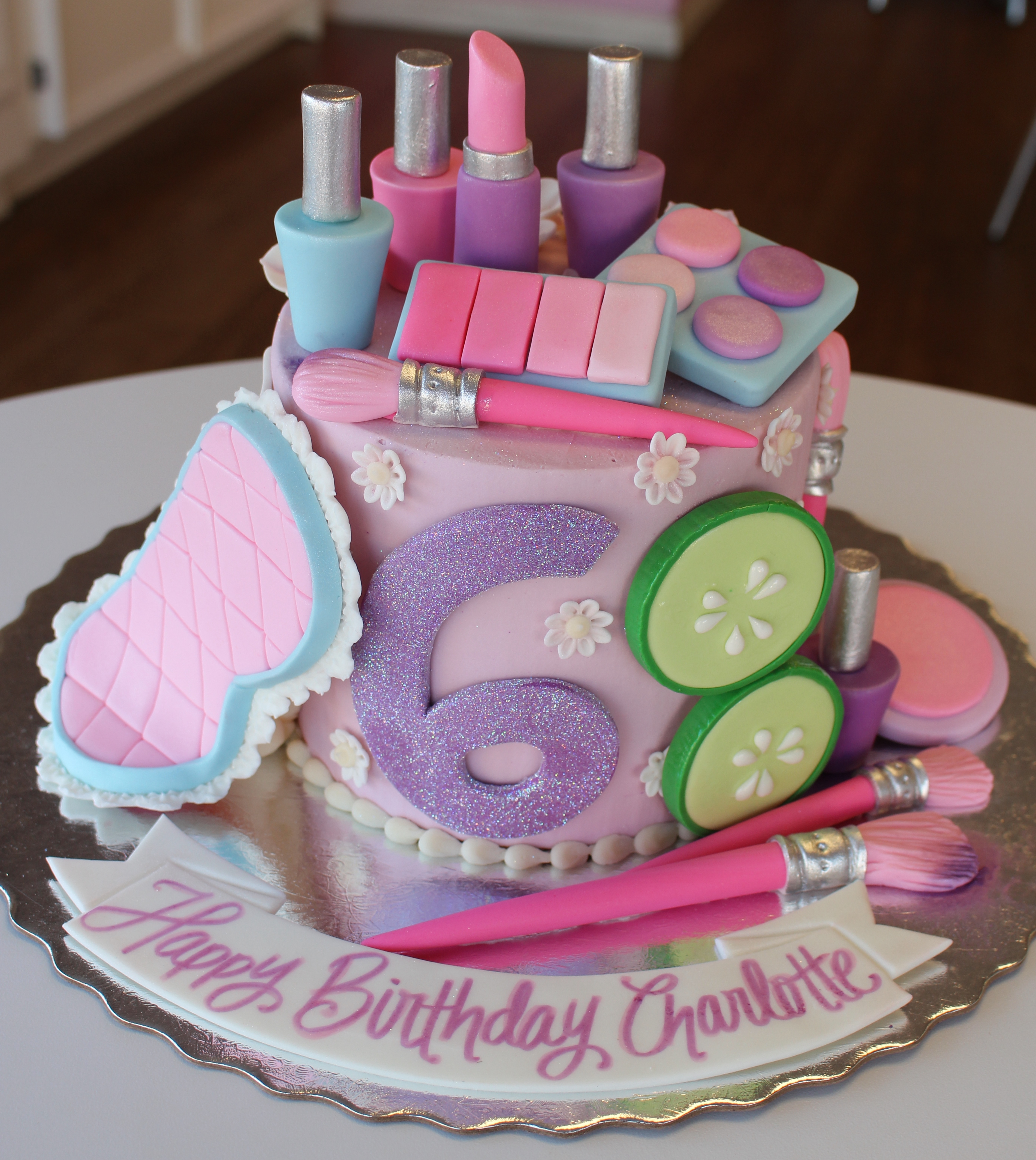 Light Purple Spa Makeover Theme Cake with Fondant Makeup Lip Gloss Sleep Mask and Cucumbers