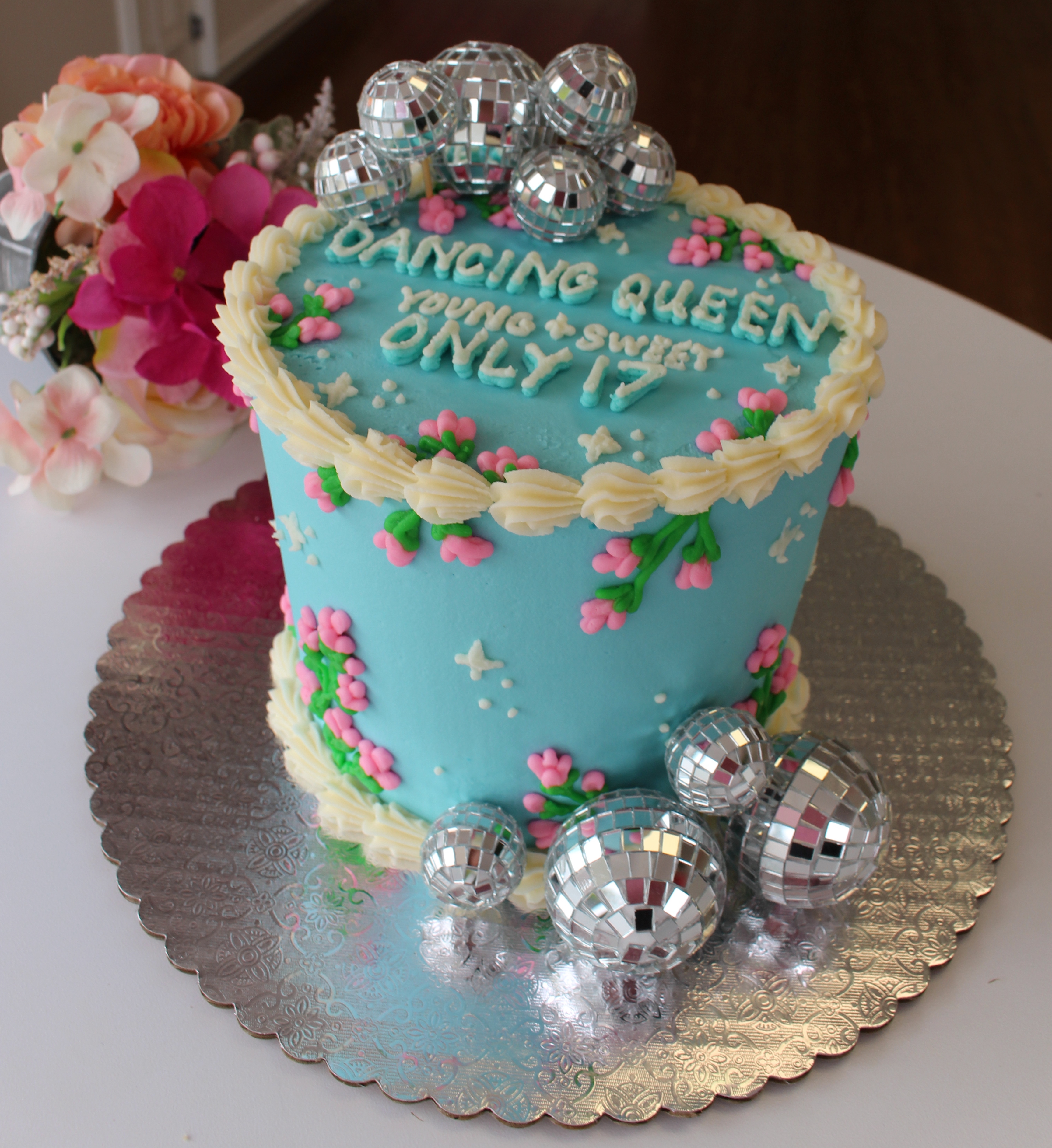 Minimalist Mama Mia Theme Cake With Hand Piped Flowers and Mini Disco Balls