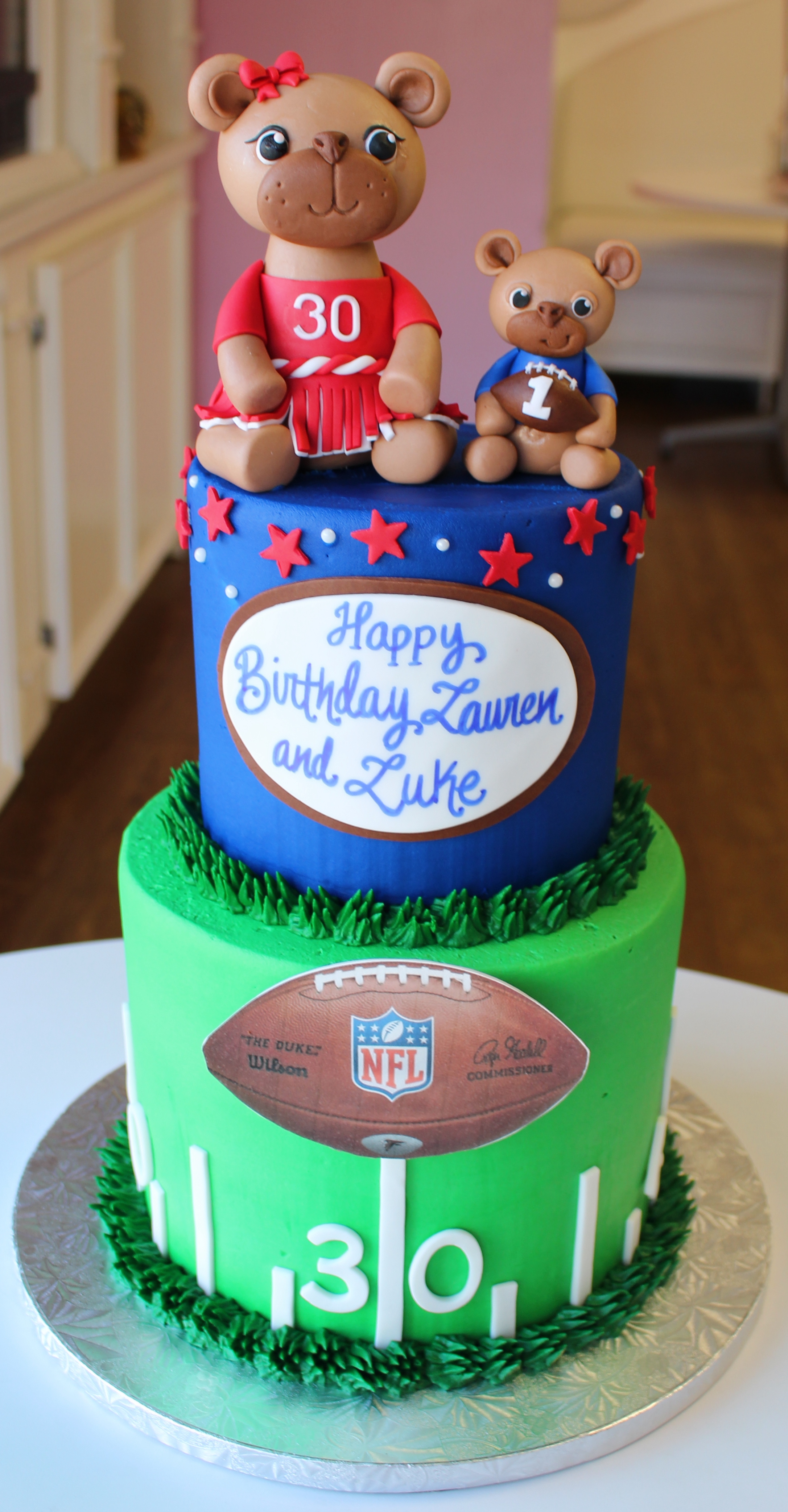 NFL Themed Blue Red and Green Kids Cake with Football Fondant Bear Figures and Buttercream Grass