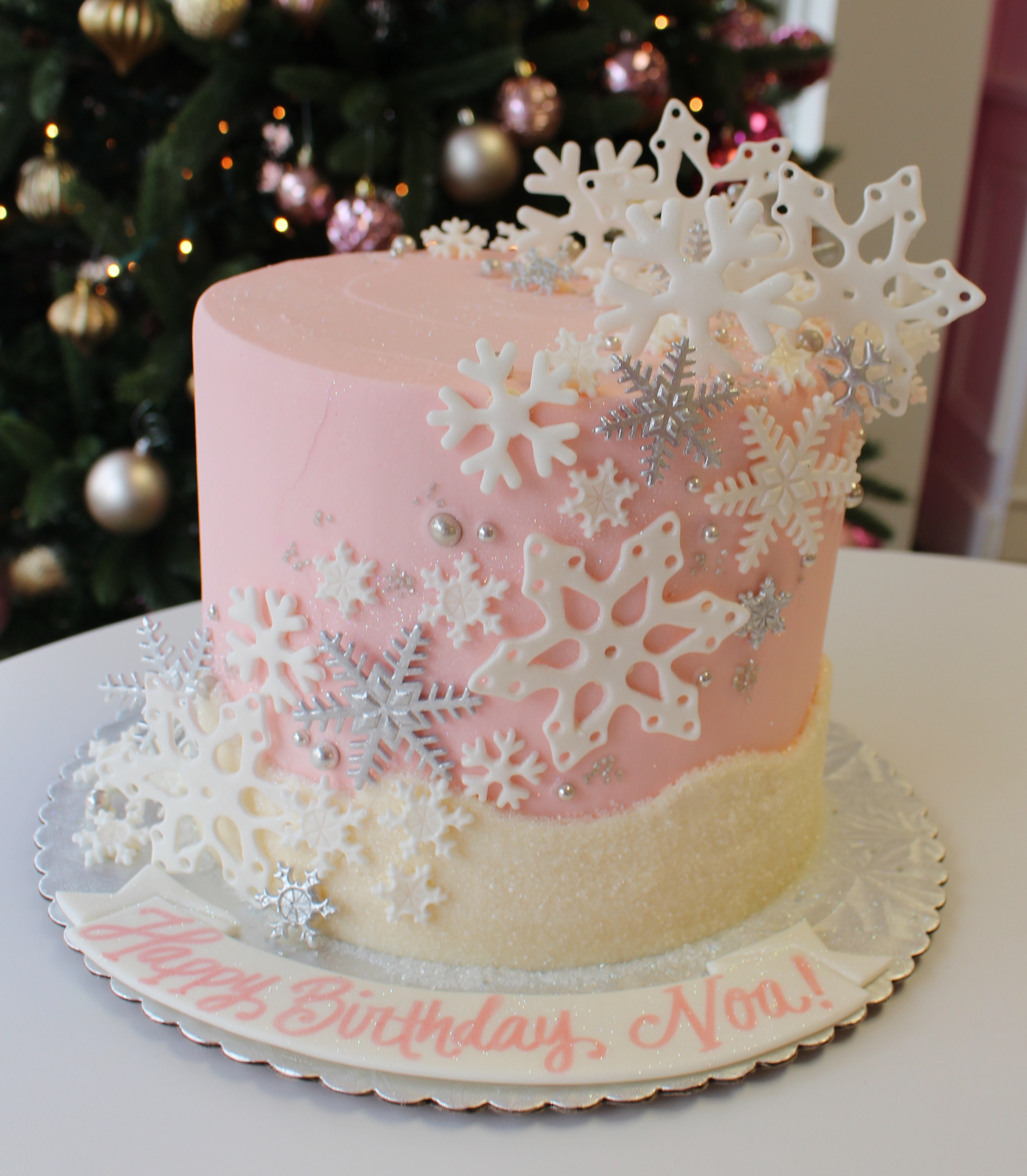 Pink and White Snow Winter Theme Cake with Fondant White and Silver Snowflakes and Sanding Sugar