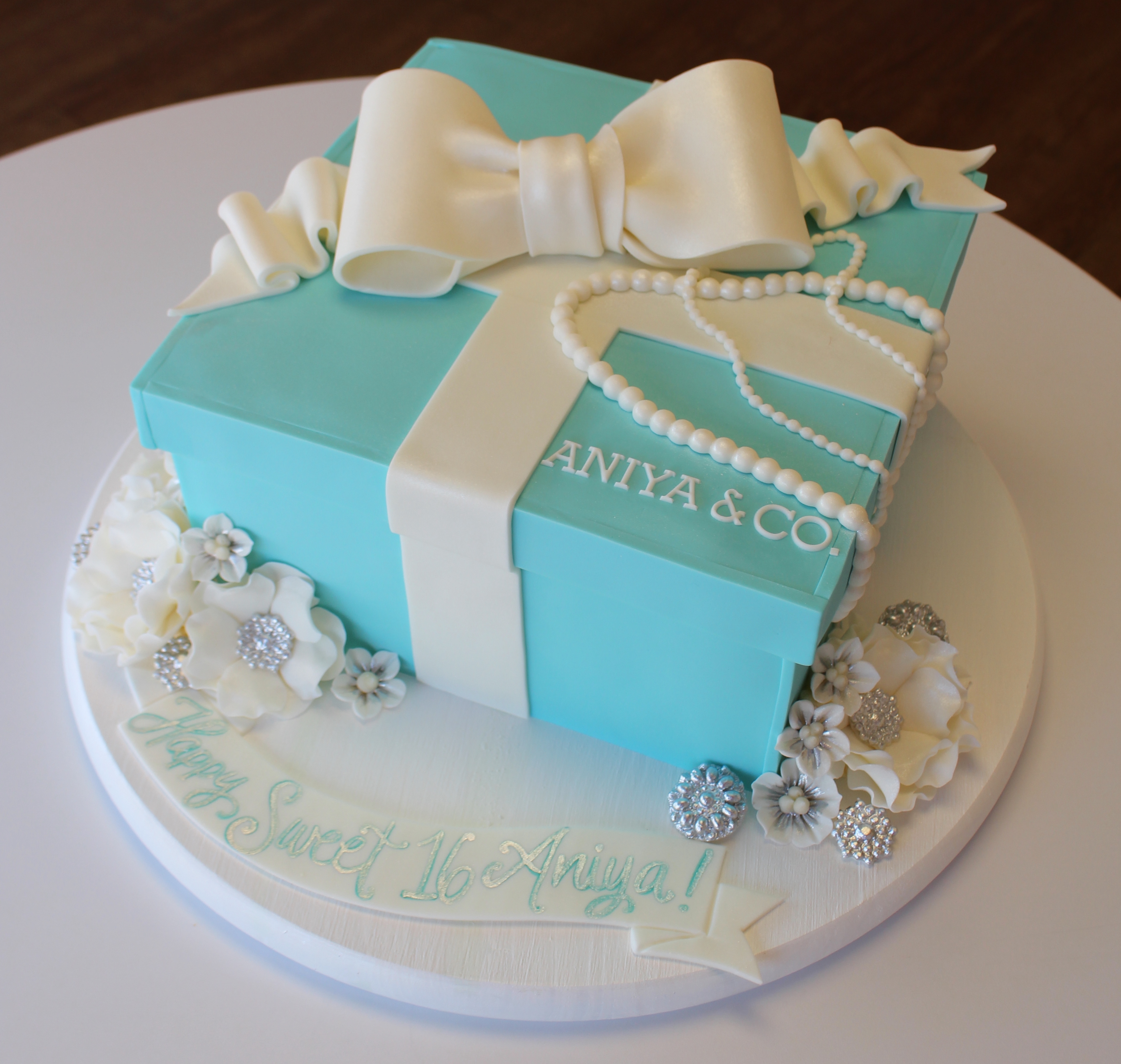 Tiffany Blue Gift Box Shaped Cake with White Fondant Bow, Flowers, and Pearls
