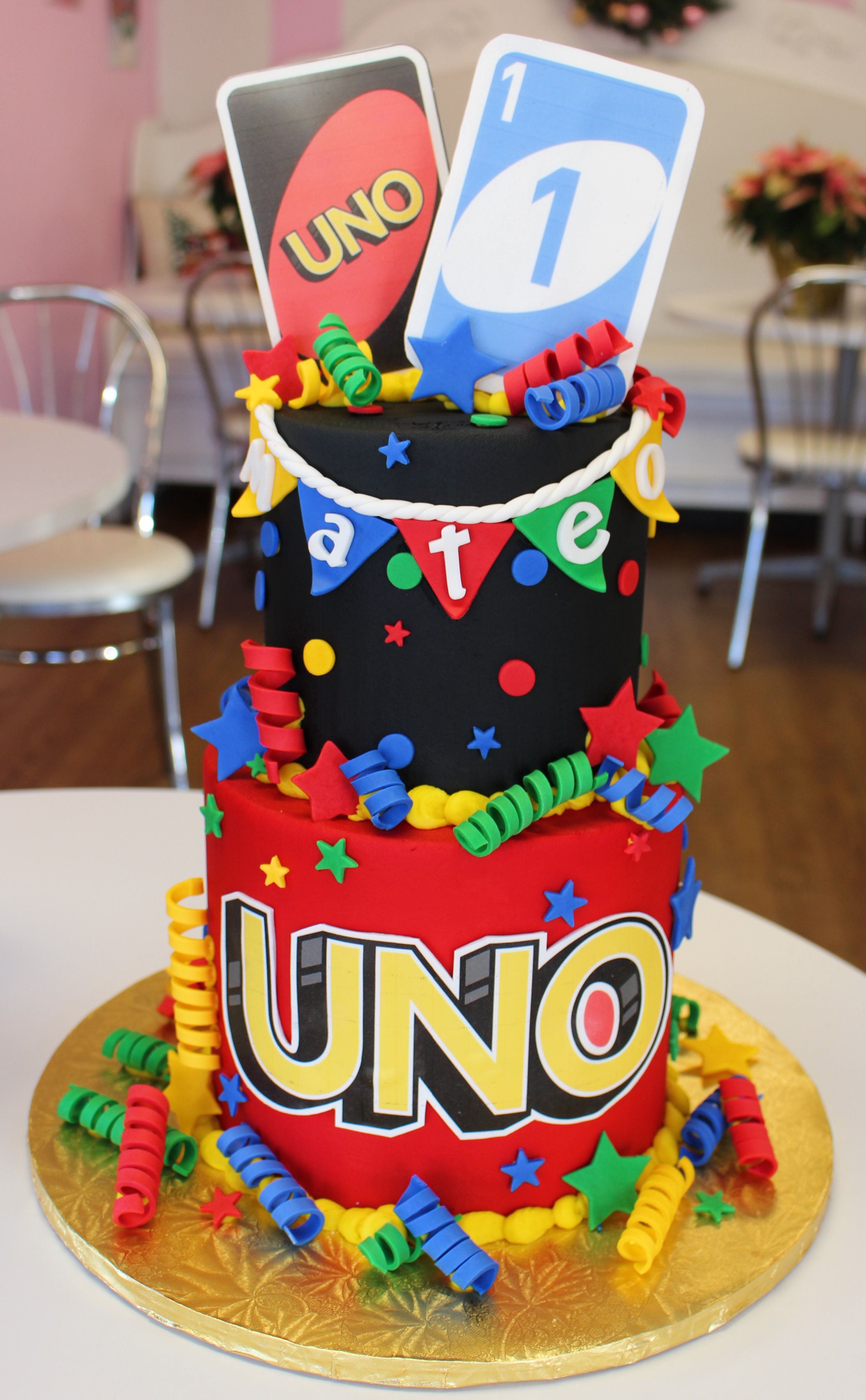 Two Tier Black and Red Uno Themed Cake with Fondant Uno Cards Banner and Decorations