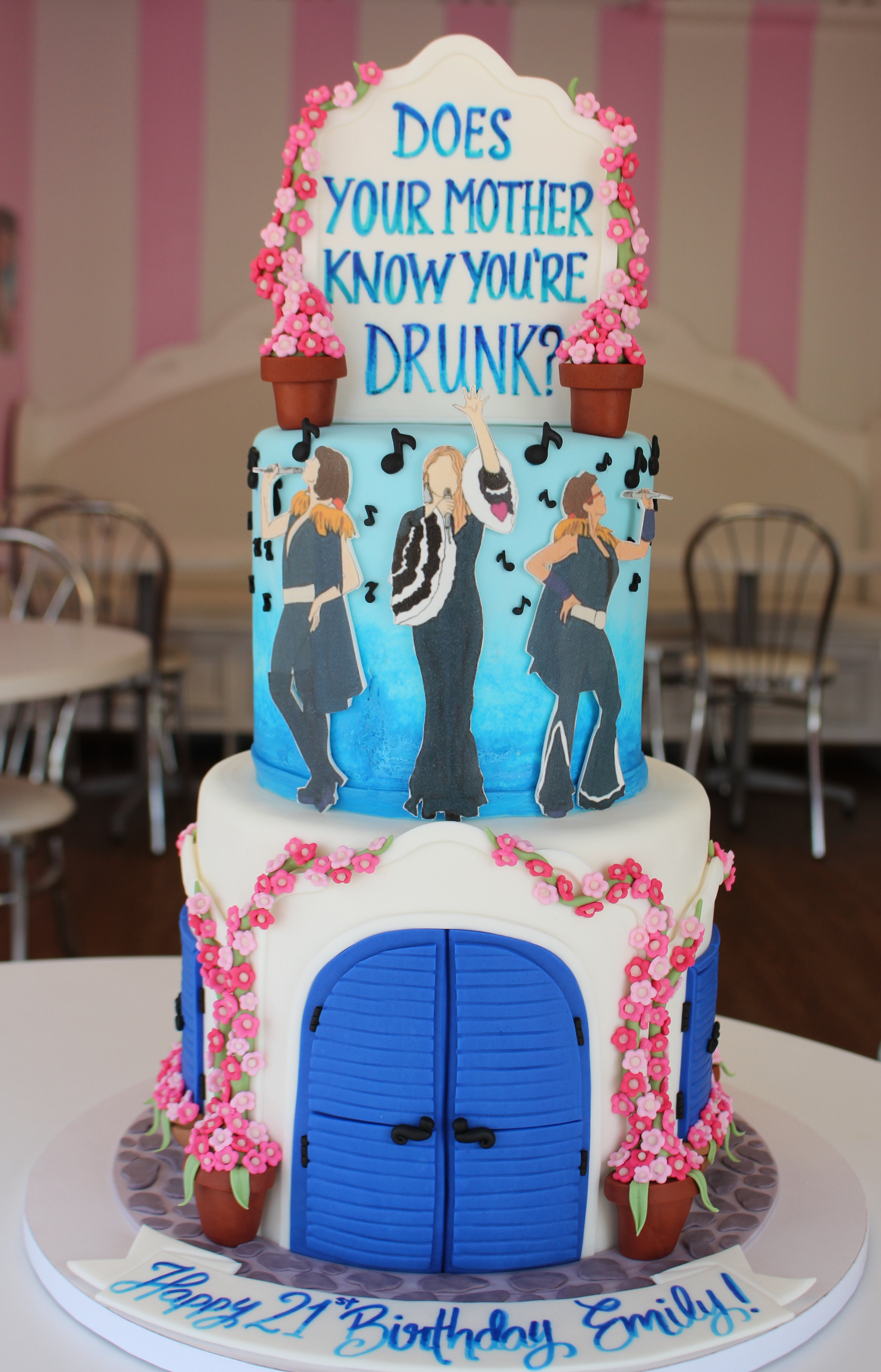 Two Tier Mama Mia Themed 21st Birthday Cake with Fondant Flower Pots, Music Notes, and Doors