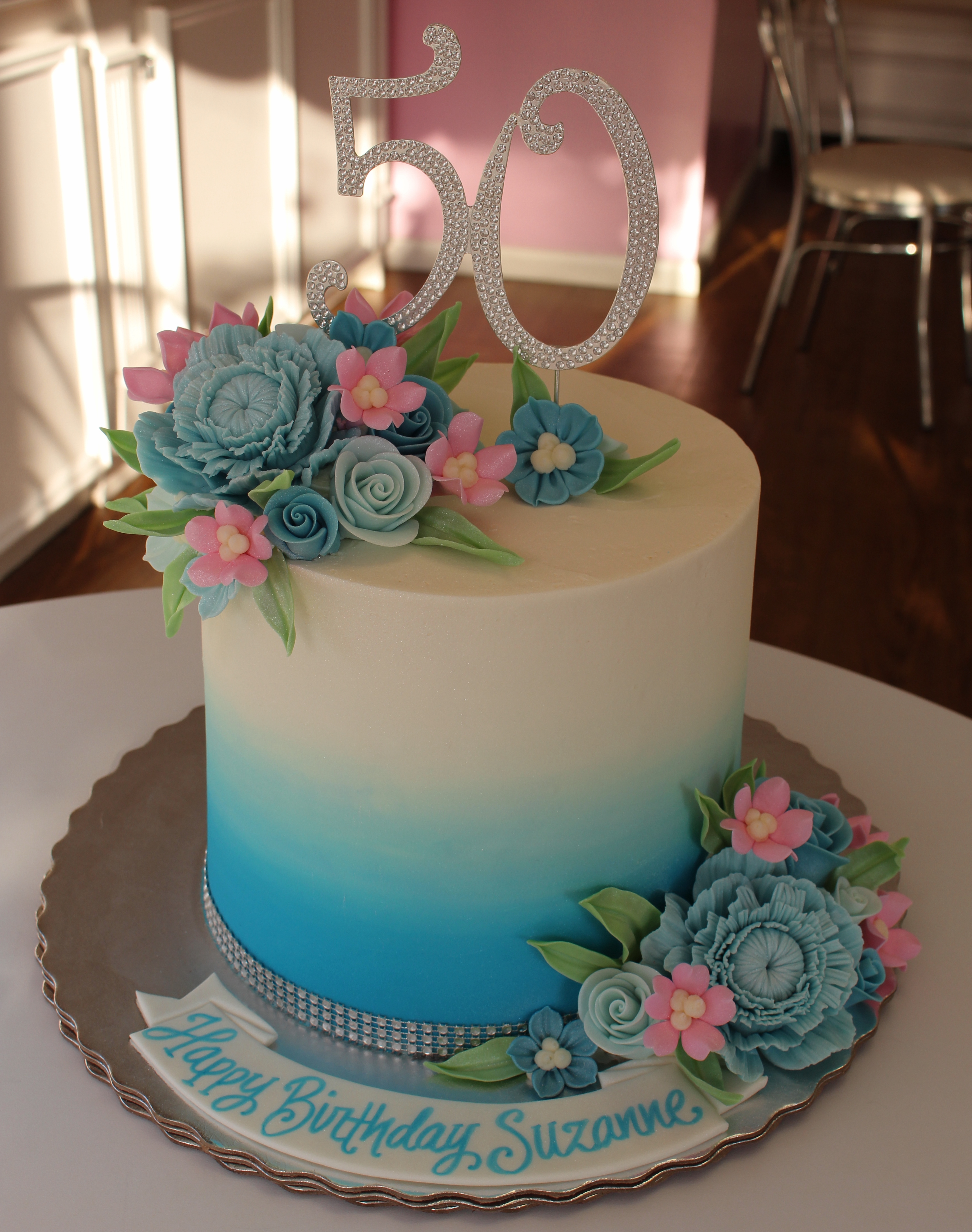 White and Blue Elegant Ombre Cake with Fondant Flowers and Leaves