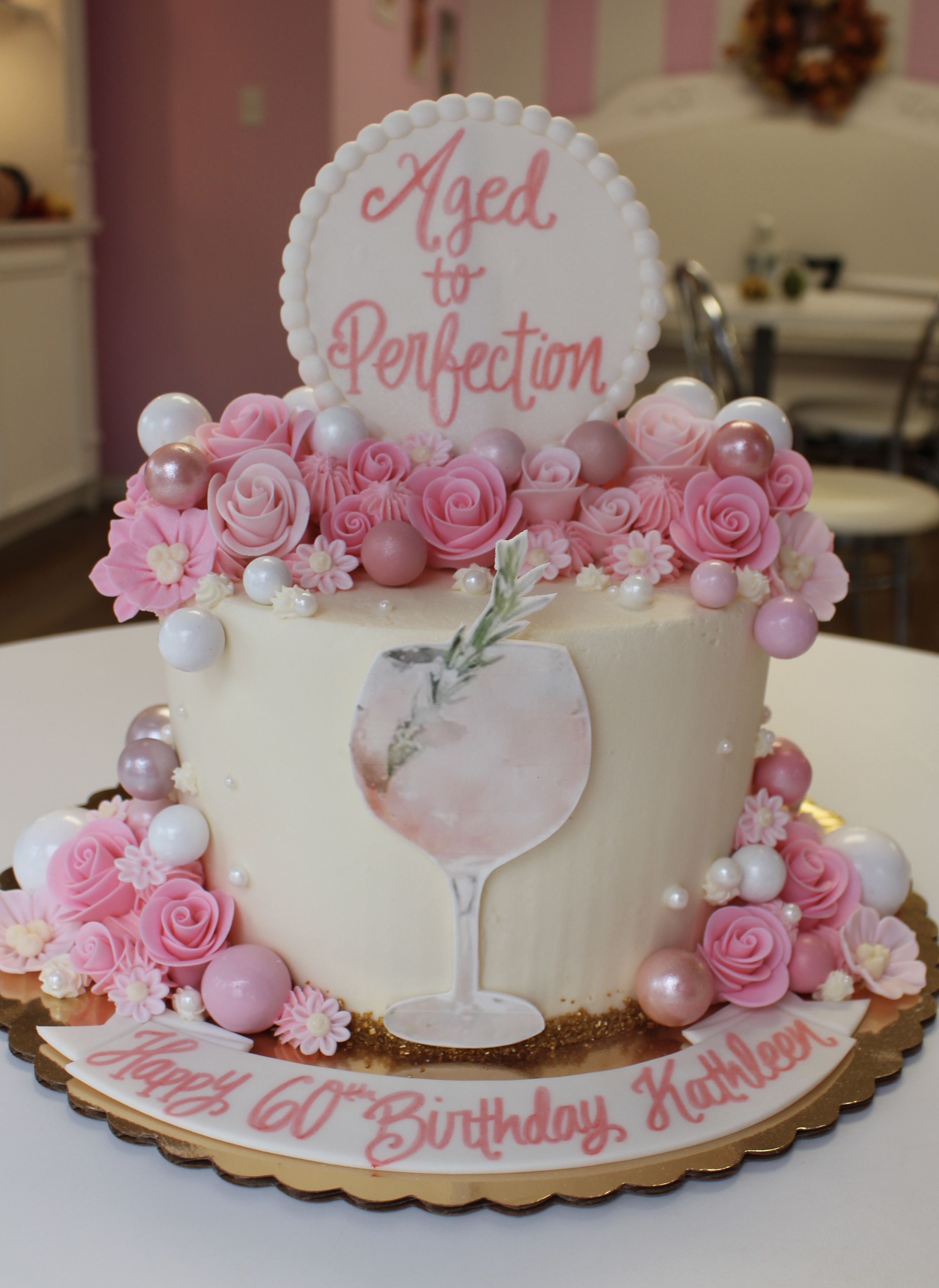 Wine Aperol Spritz Martini 'Aged to Perfection' White Birthday Cake with Pink and Rose gold Flowers and Balloons
